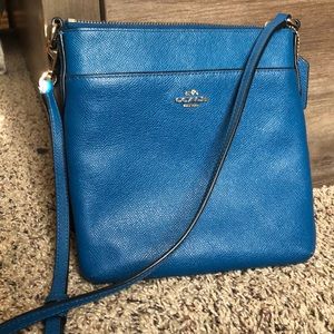 Blue cross body coach purse